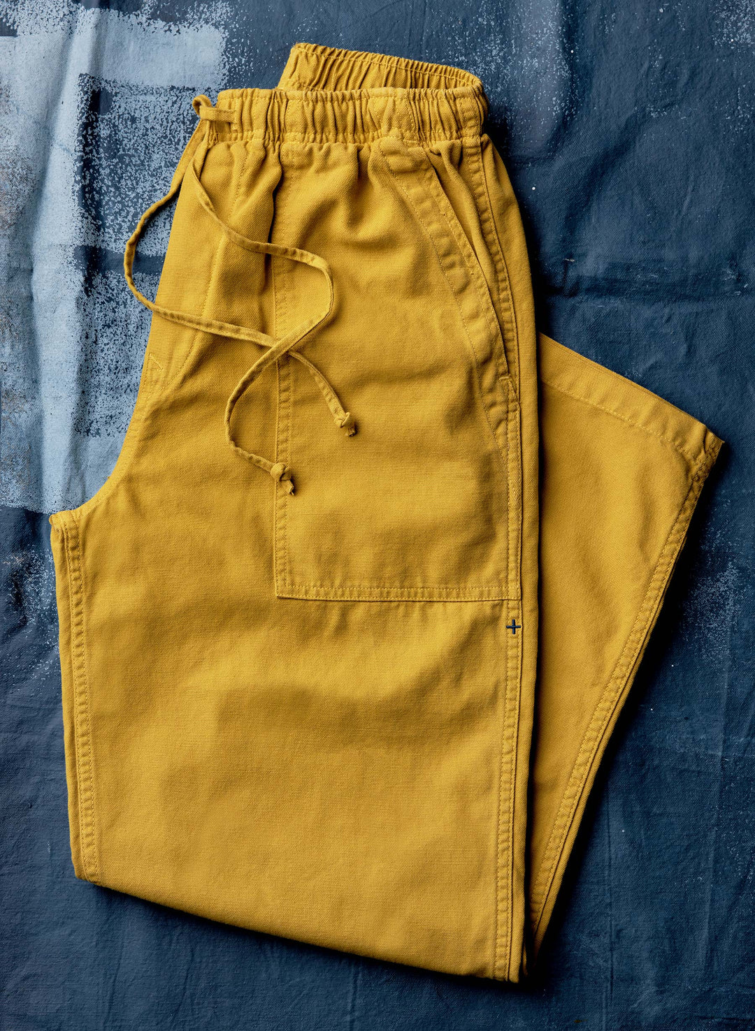 a pair of yellow pants