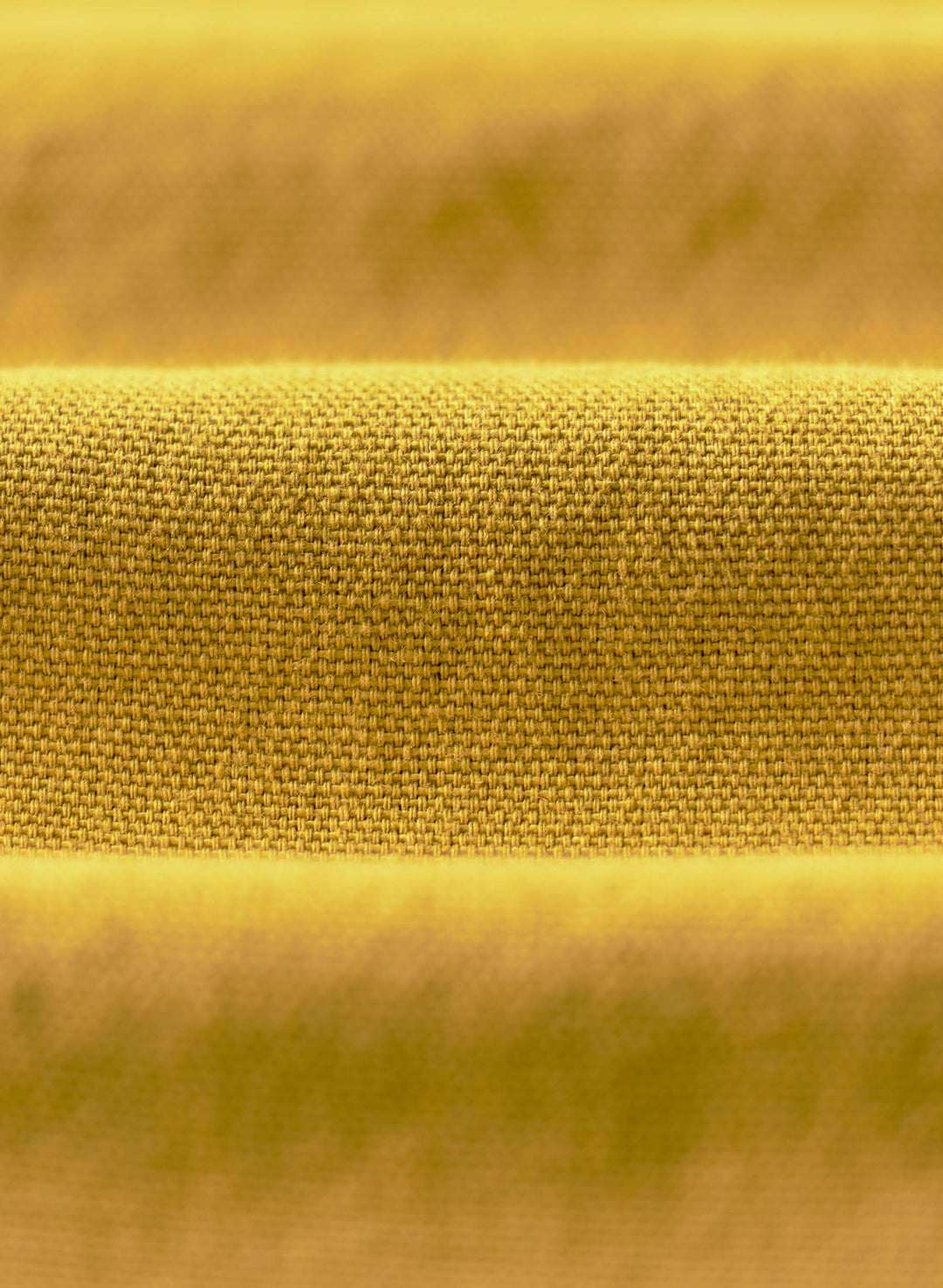 a close up of a yellow fabric