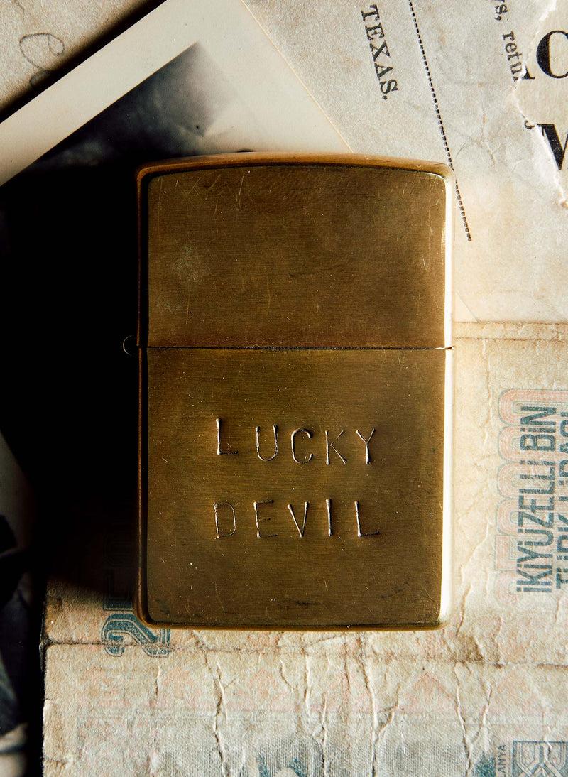 hand stamped "lucky devil" zippo - Model