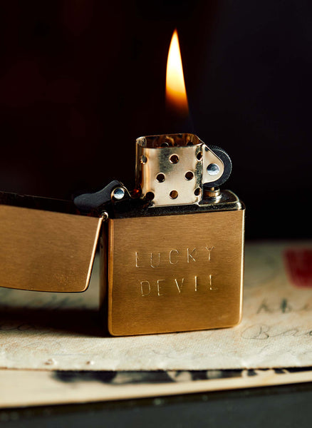Hand stamped "lucky devil" zippo