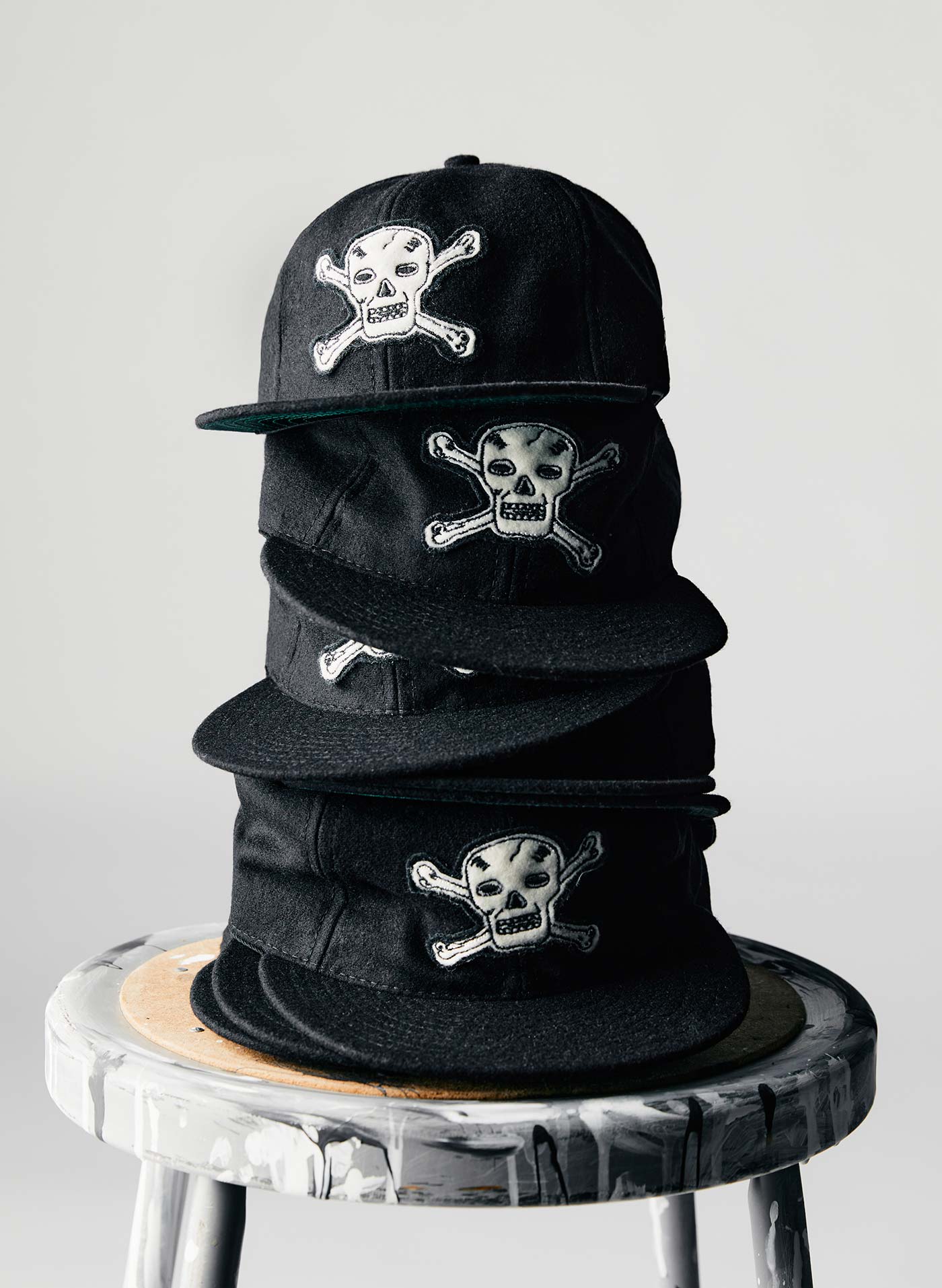 Cap, Headgear, Font, Costume hat, Hat, Fashion accessory, Baseball cap, Costume accessory, Peaked cap, Logo