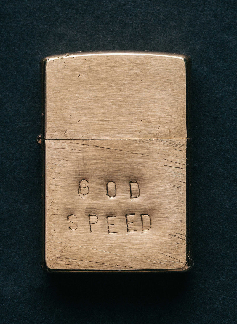 hand stamped “godspeed” zippo