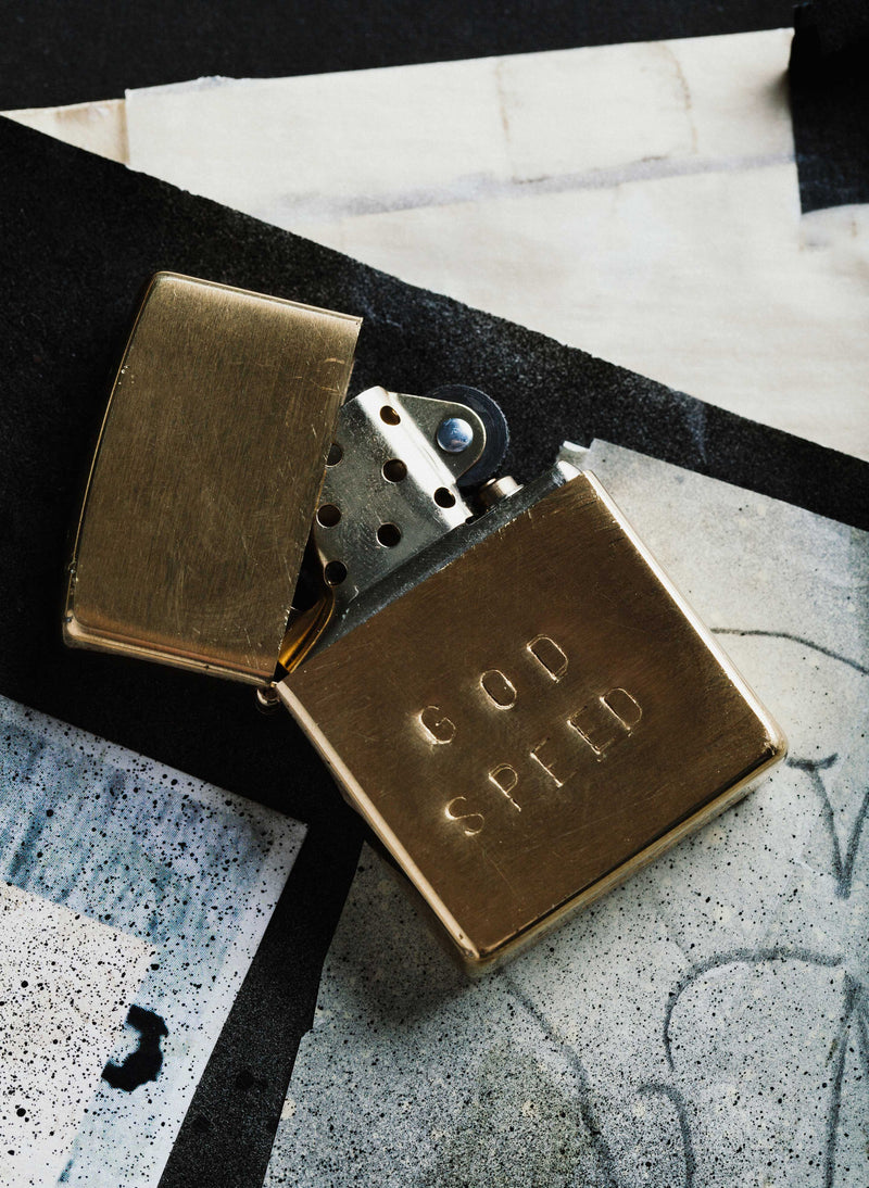 hand stamped “godspeed” zippo