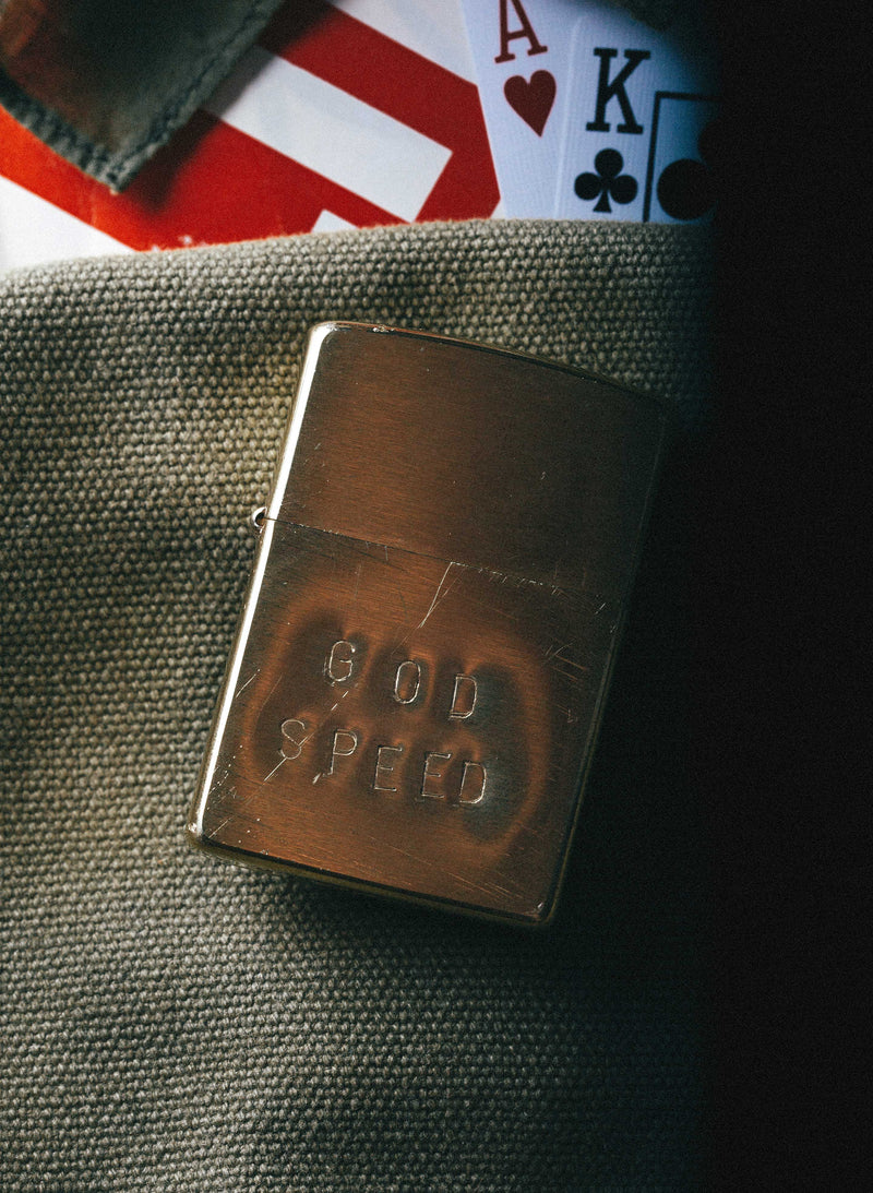 hand stamped “godspeed” zippo