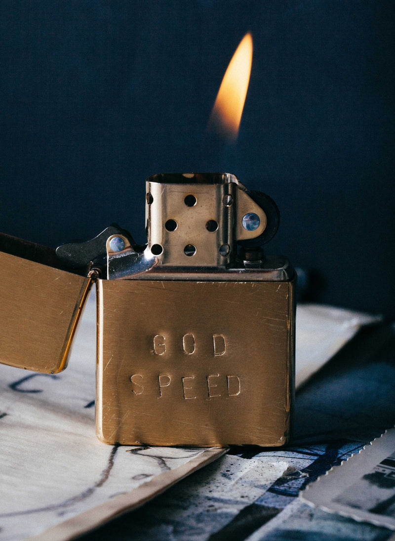 hand stamped “godspeed” zippo