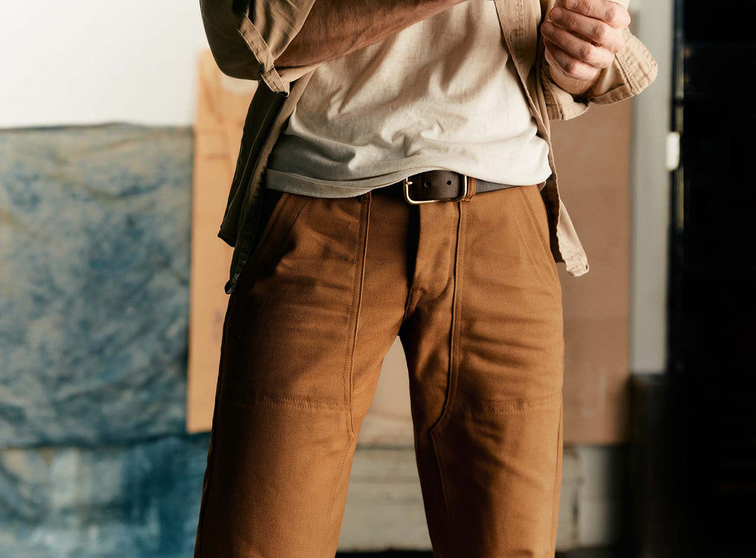 a man in brown pants