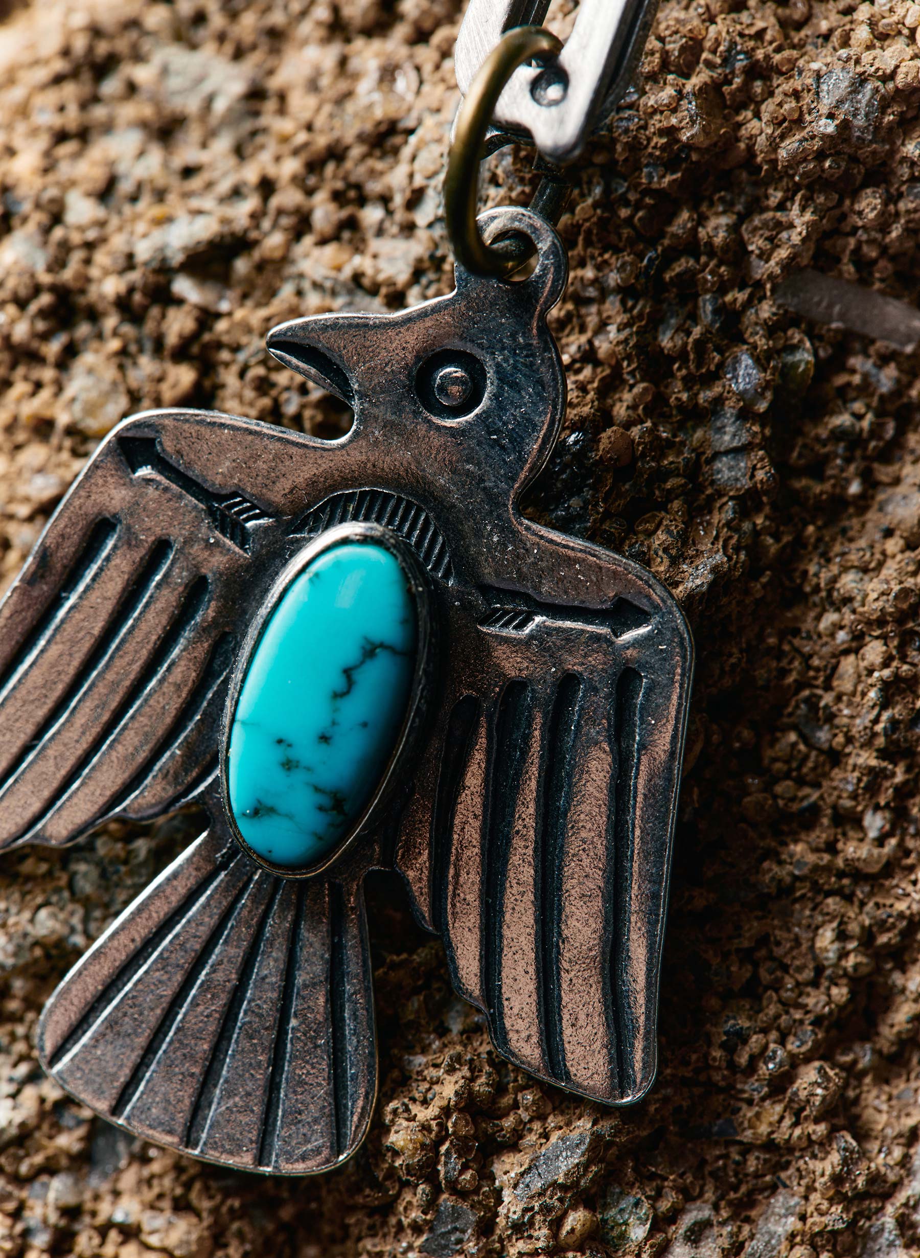Azure, Wood, Body jewelry, Font, Jewellery, Rock-climbing equipment, Natural material, Electric blue, Metal, Circle