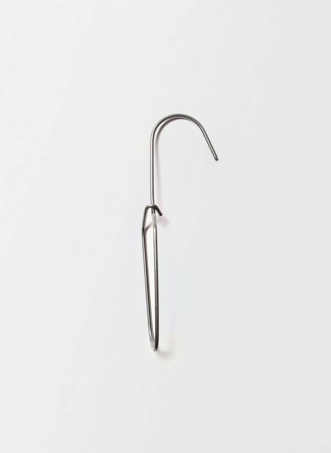 a metal hook with a white background
