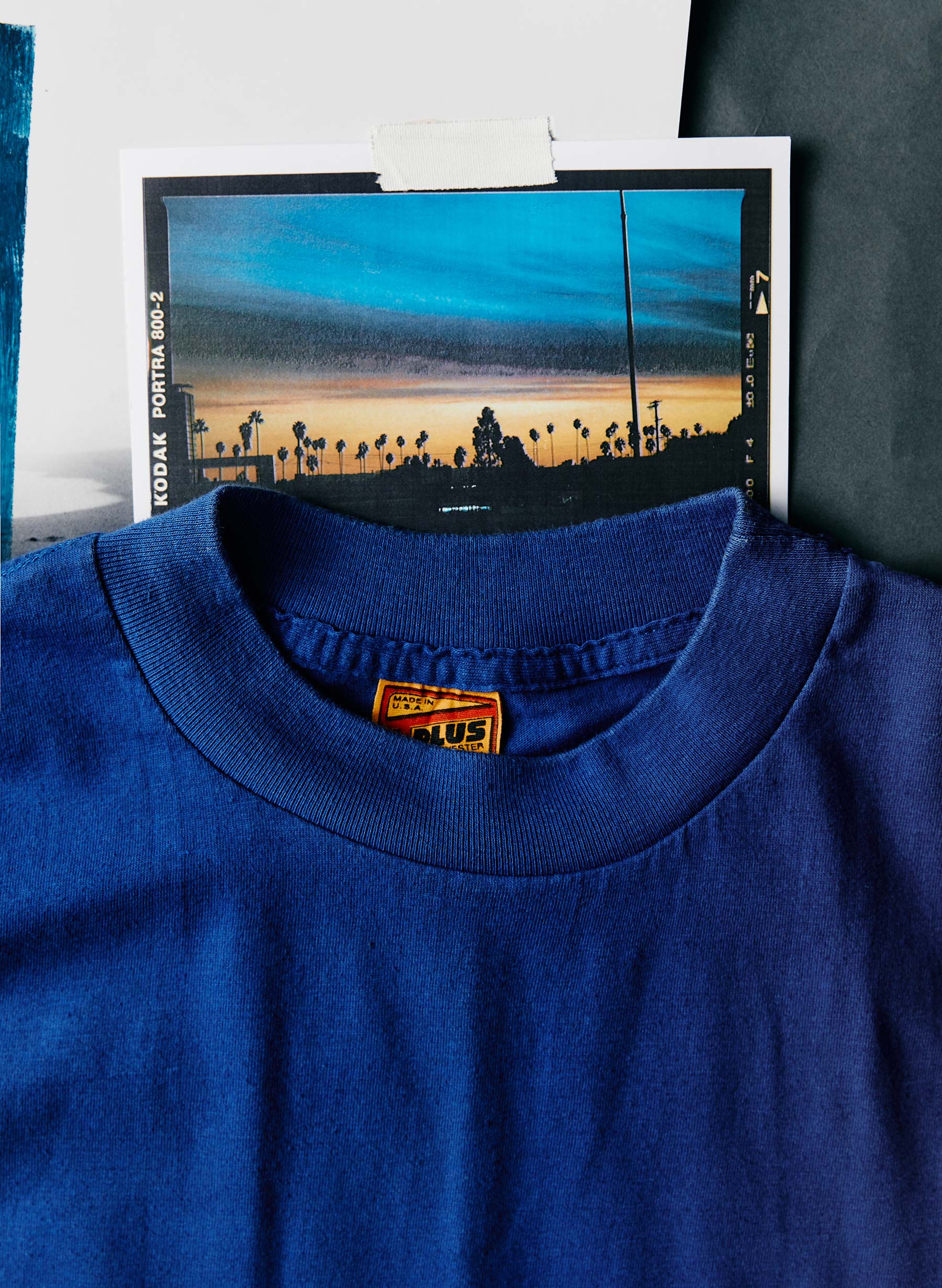 Outerwear, Product, Azure, Blue, Textile, Sleeve, T-shirt, Collar, Jersey, Font