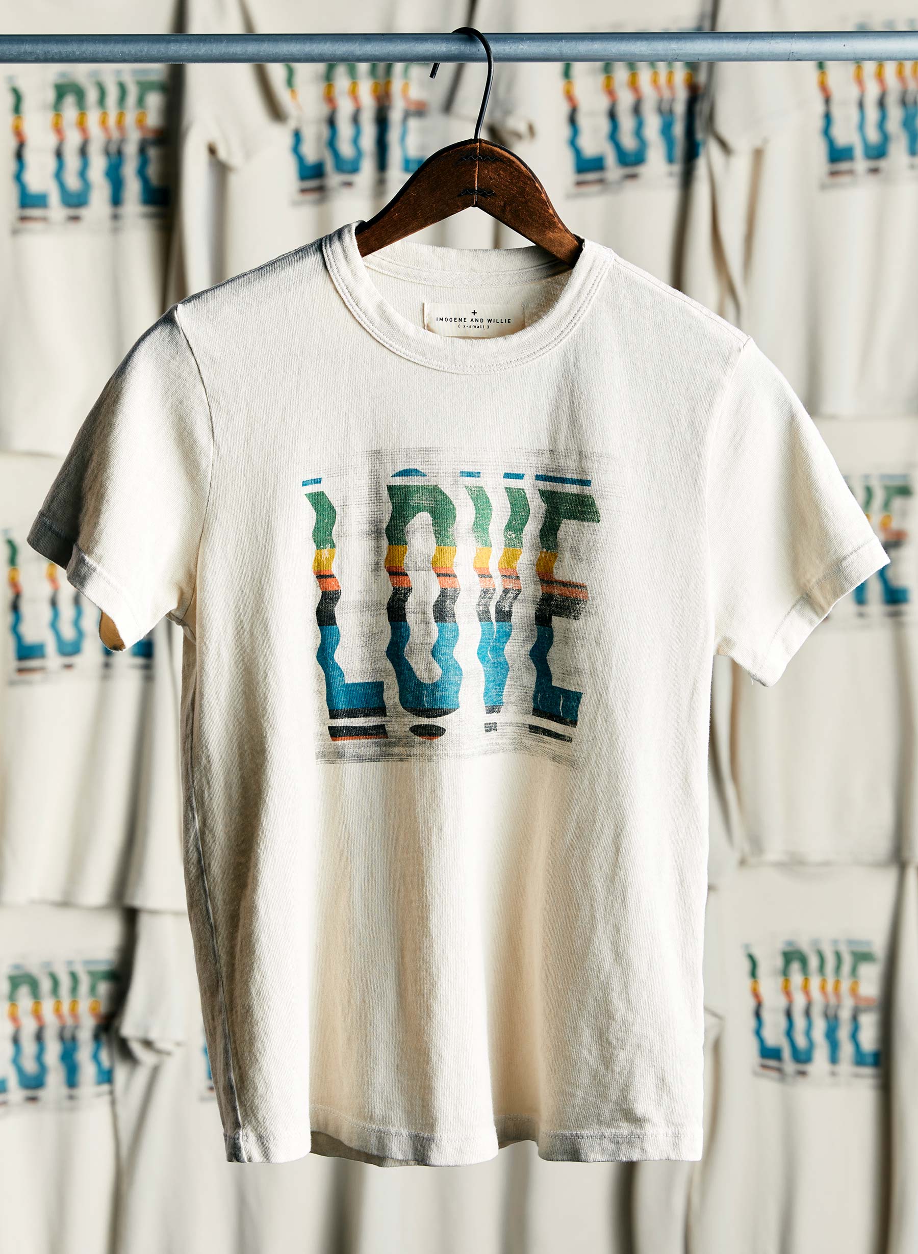 a white shirt with a colorful text on it