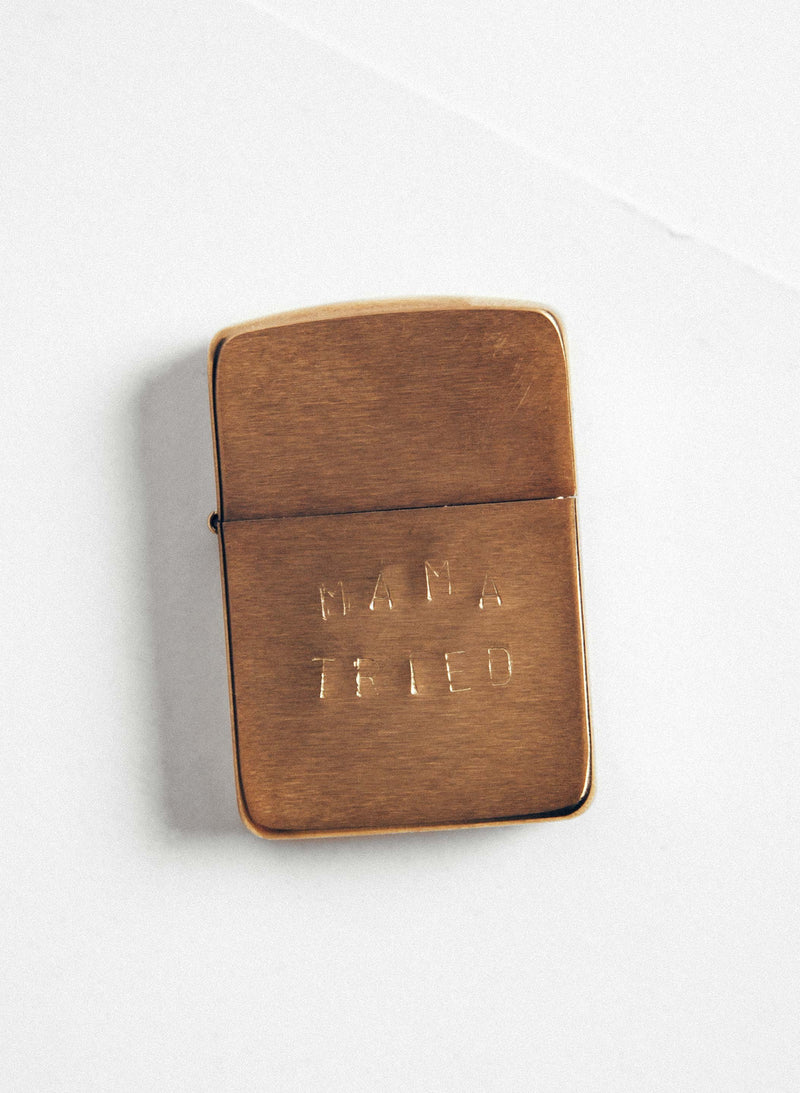 hand stamped "mama tried" zippo