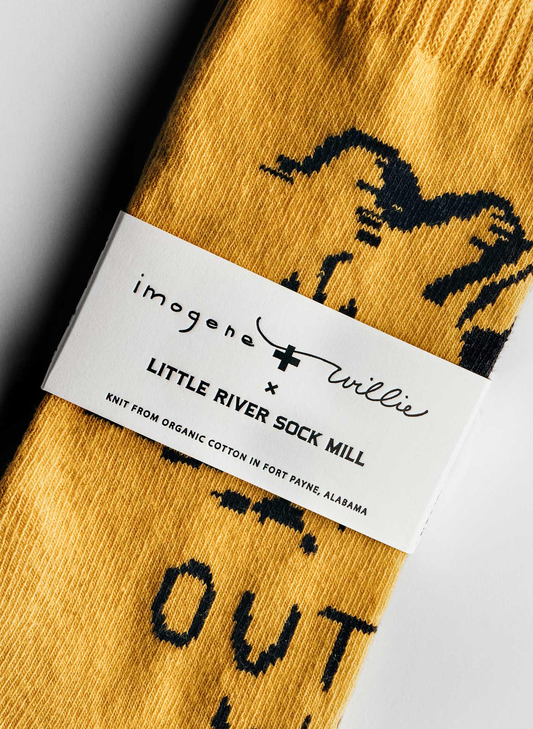 a yellow sock with black text on it