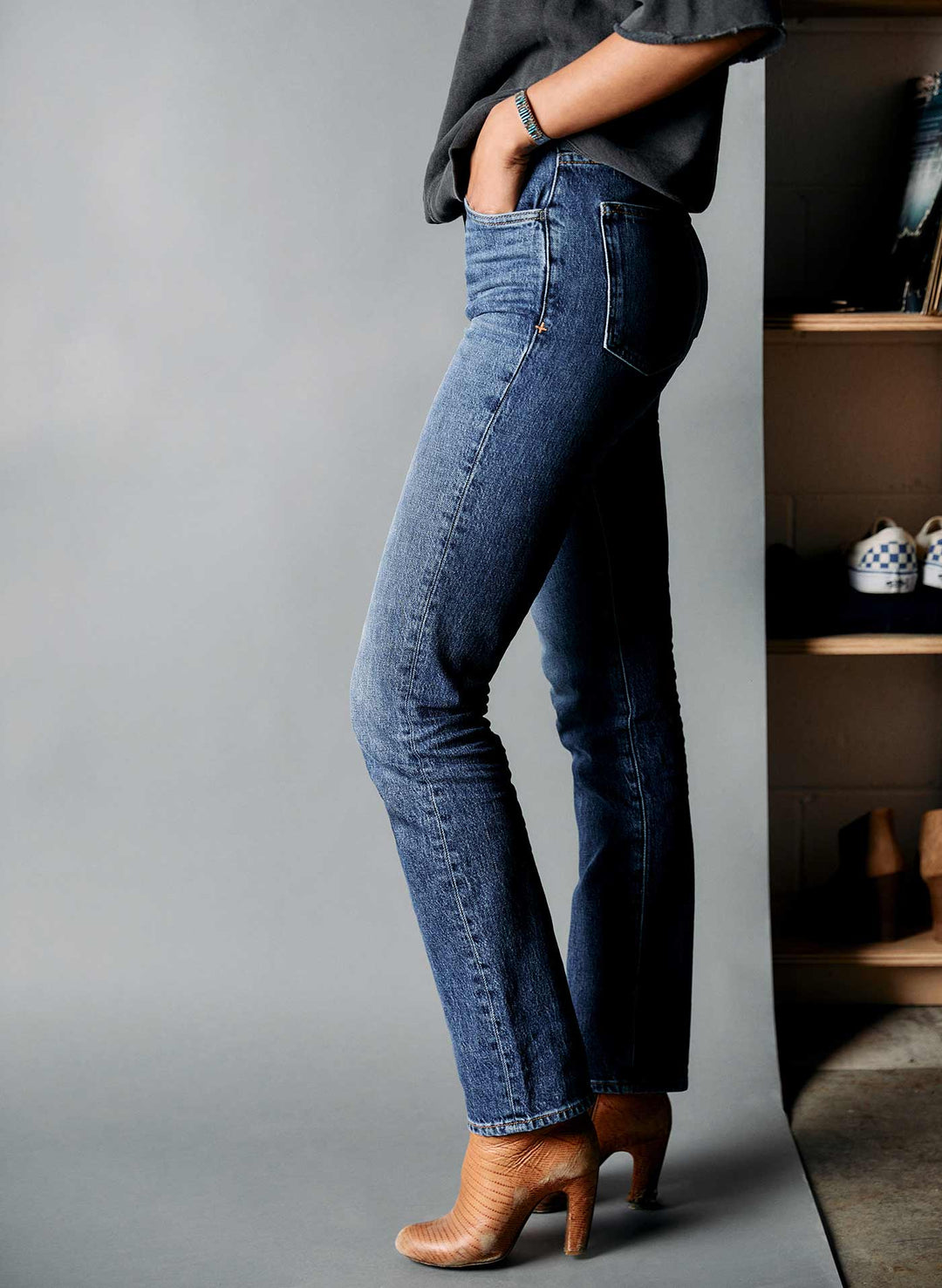 a woman in blue jeans