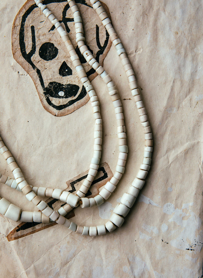 vintage white goomba trade bead necklace